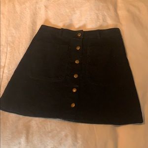 Velvet high waisted mini skirt with button detail